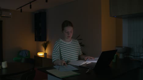 Young Woman Studying Late at Night