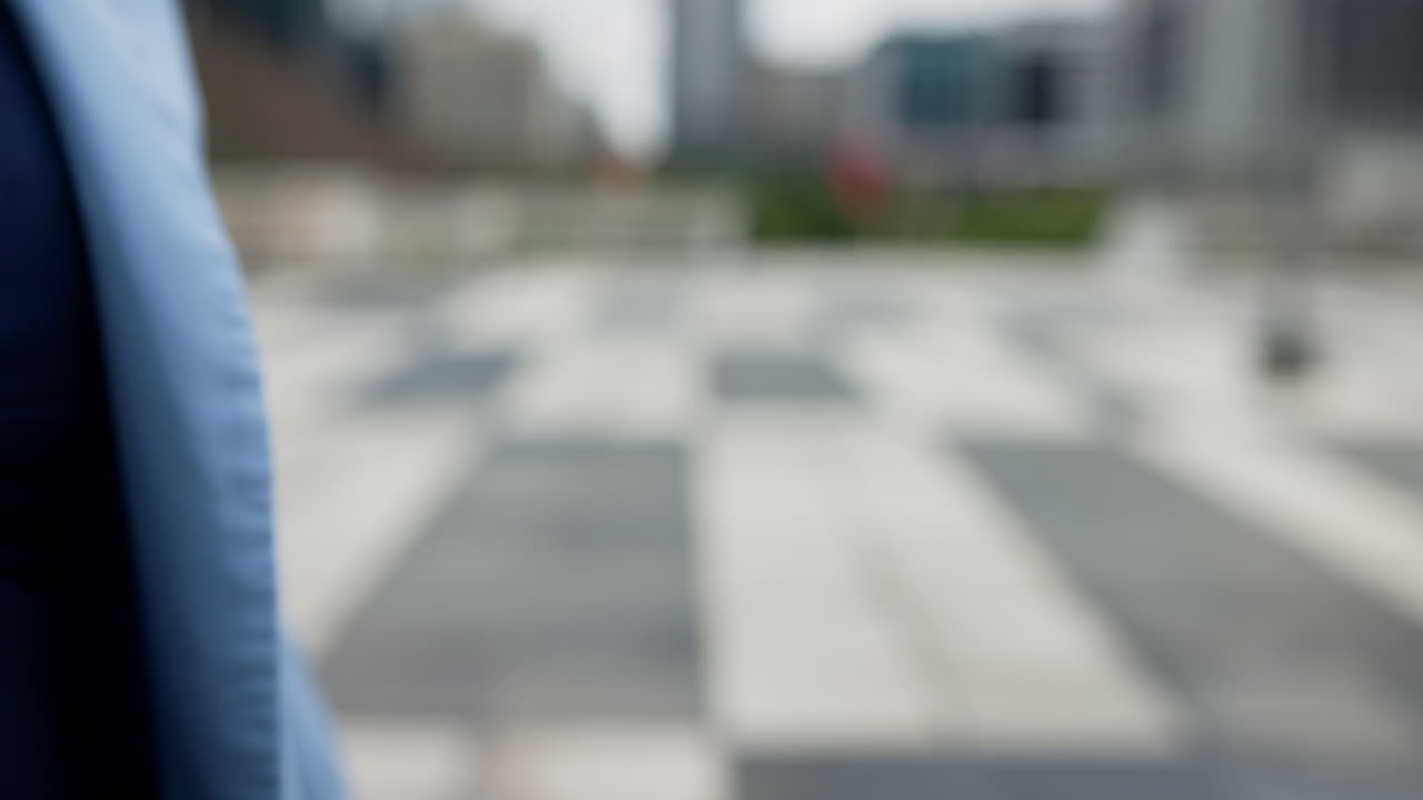 Close-up of a person checking the time on their watch