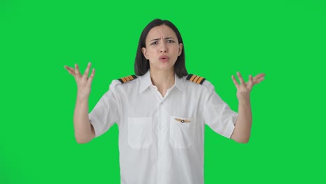 angry indian woman pilot shouting on someone green screen