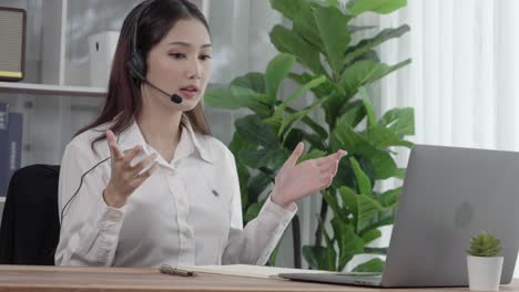 enthusiastic female operator provide helpful customer service to customer.