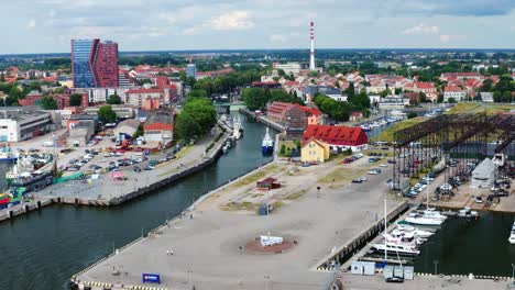 aerial view of port of klaipeda with ships in the canal - lithuania