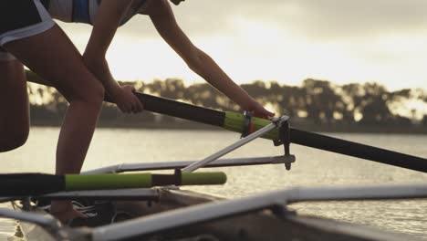 Female-rowing-team-training-on-a-river