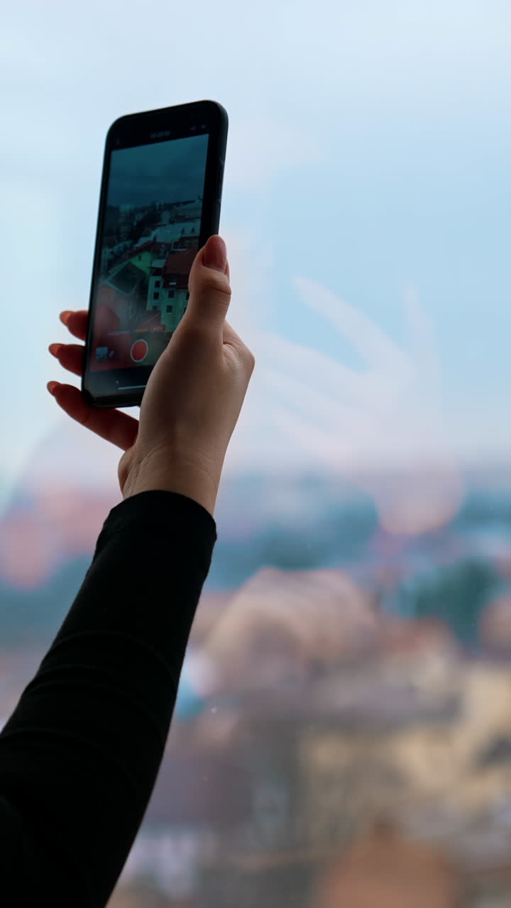 Beautiful Young Woman while Using her Mobile Phone. Vertical video
