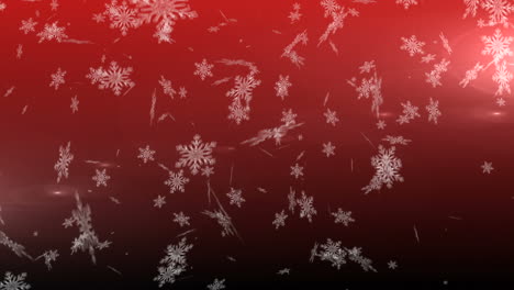 copos de nieve cayendo contra un fondo rojo