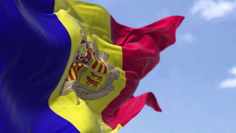 detail of the national flag of andorra waving in the wind on a clear day