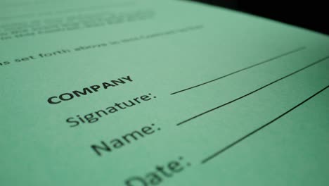 signing a company document