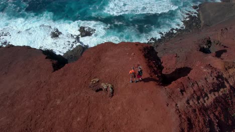 aerial drone view of mountain sea and volcanoes in lanzarote, canary islands, spain