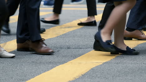 close up of people walking on crowded street in slow motion