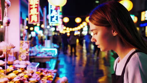 teenager at a bustling night market