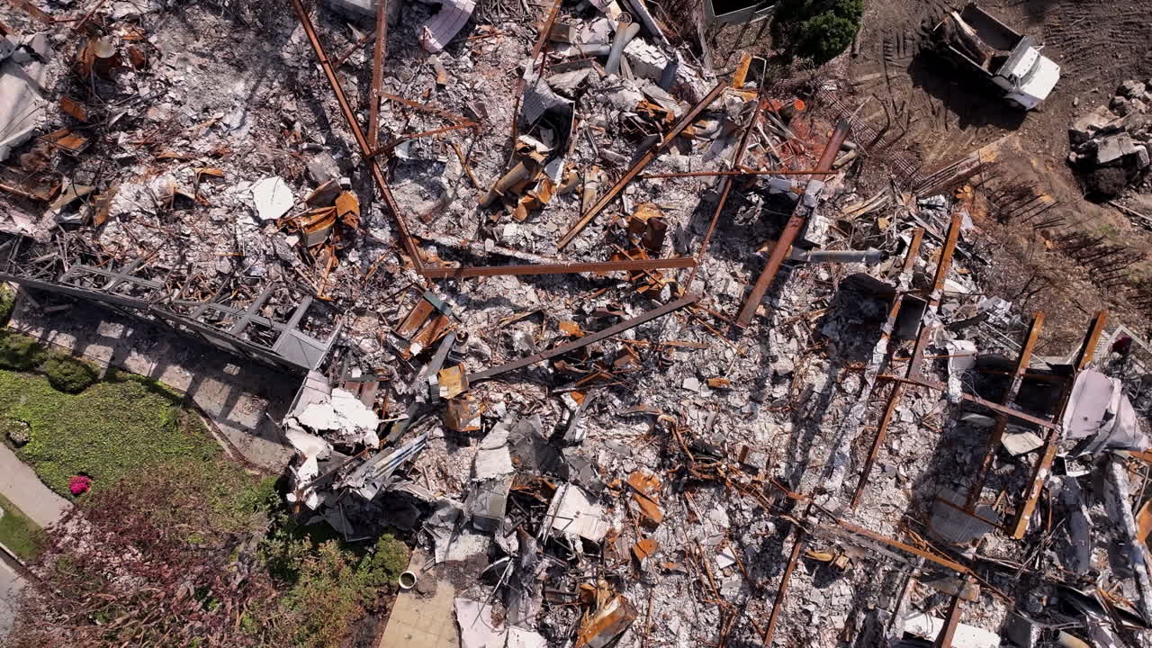 Aerial View of Extensive Rubble and Charred Remains After a Disaster