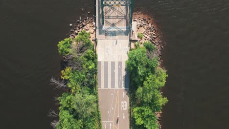 Aerial bird&#039;s eye shot flying over the St. Croix River Lift Bridge from Houlton, Wisconsin to Stillwater, Minnesota. 4K