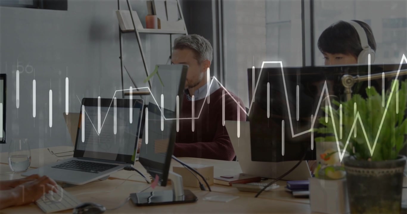 Vertical video: Coworkers typing, starting waveform showing numbers on monitors for tech analysis