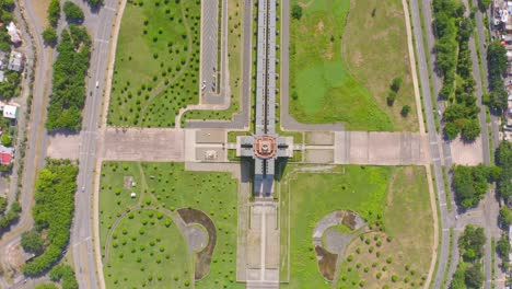 Fly-over-cross-shaped-monument-of-Christopher-Columbus,-Santo-Domingo,-Dominican-Republic