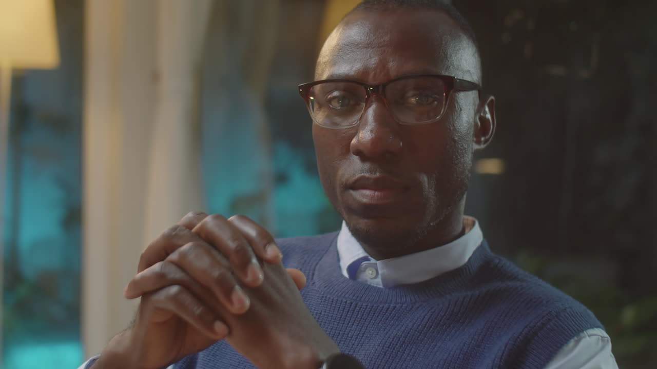 Portrait of Serious African American Therapist in Office
