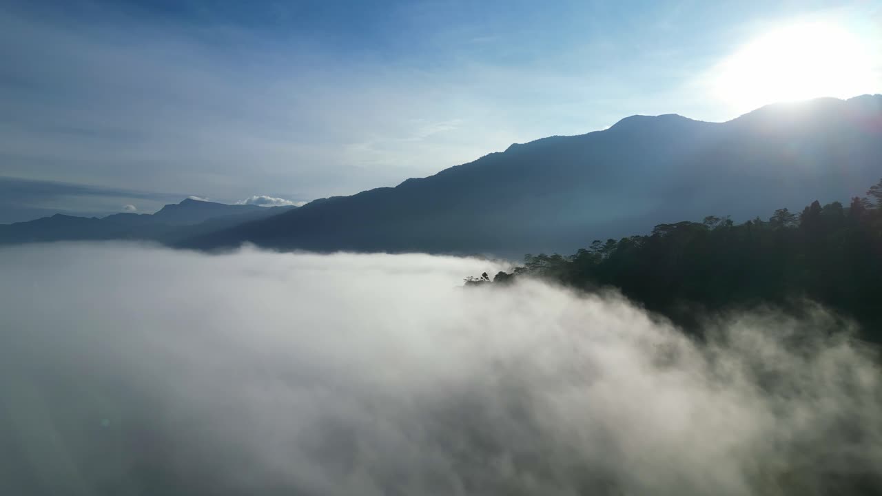 Majestic Mountain Sunrise Above the Clouds