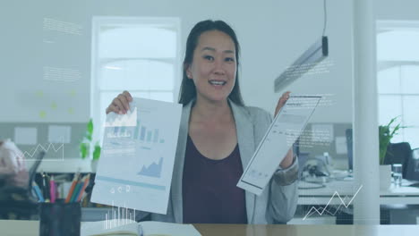 animation of financial data processing over asian businesswoman in office