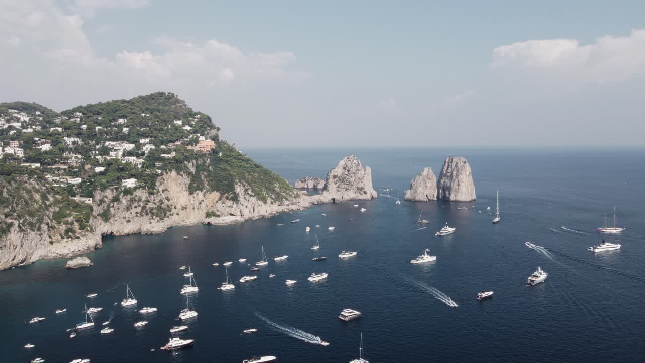 Circling around the famous cliffs and rock formations of Capri in Italy.