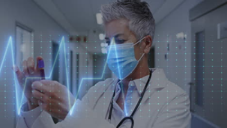 animation of heart rate montior against caucasian female doctor holding a vial bottle at hospital