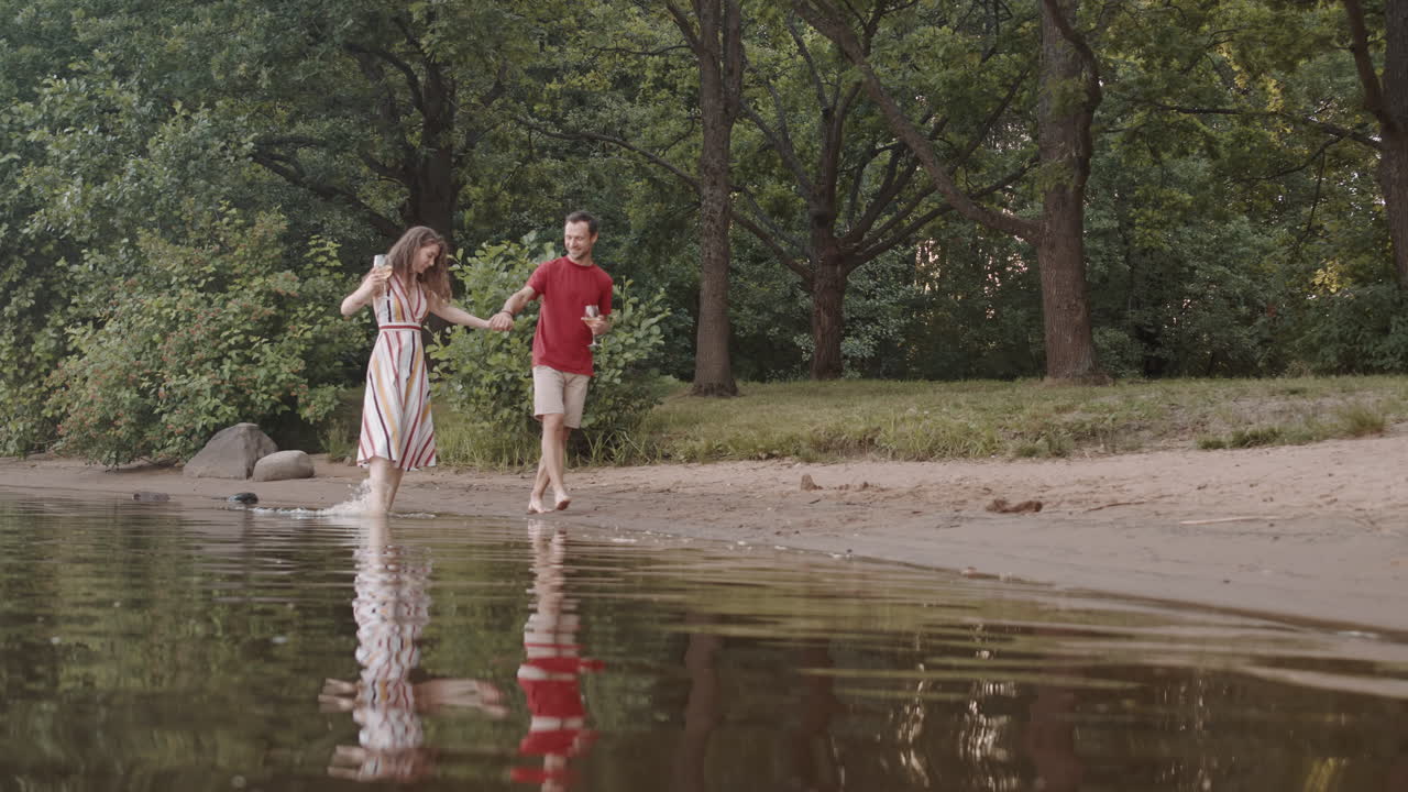 Hetero Couple Walking by Lake Shore