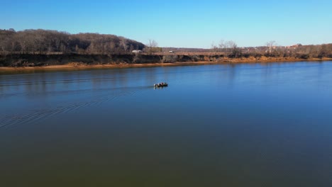 flying toward a fishing boat on the cumberland river in clarksville tennessee