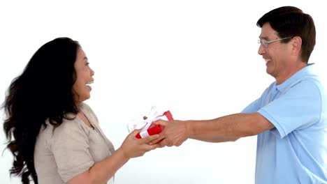 pretty woman receiving gift from husband