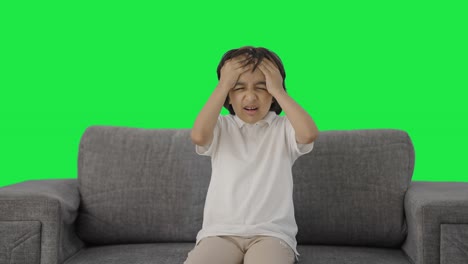 Sick-Indian-boy-having-a-headache-Green-screen