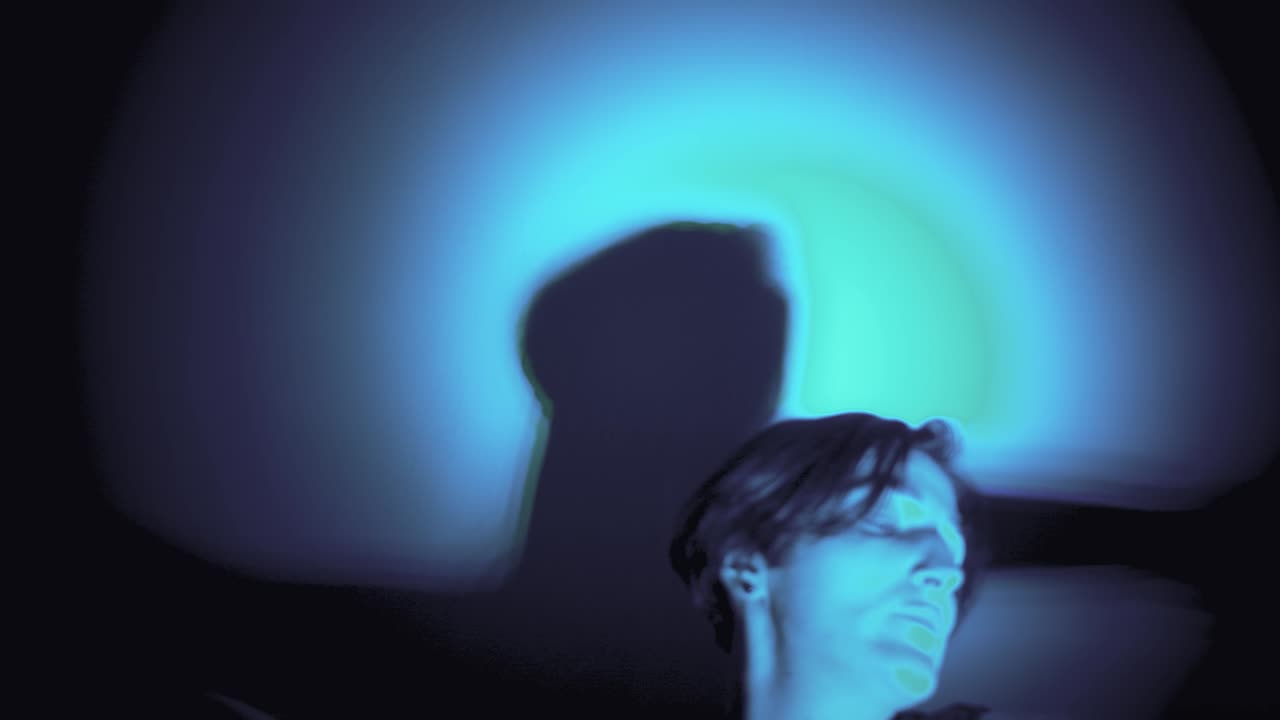 Mysterious Woman in Blue Light: Shadow Play and Surreal Portrait Photography