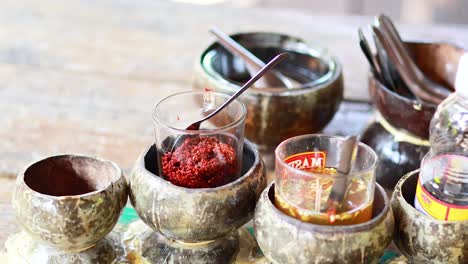 table setting with condiments and water bottle