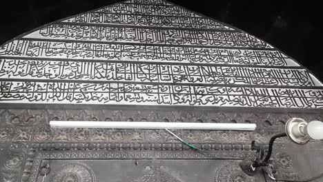 the bilingual script is placed on the south mihrab of the prayer hall. built-in black stone mosque by the faruqi ruler adil shah, jama masjid in burhanpur- madhya pradesh