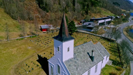 nordic style church with white facade and black roof