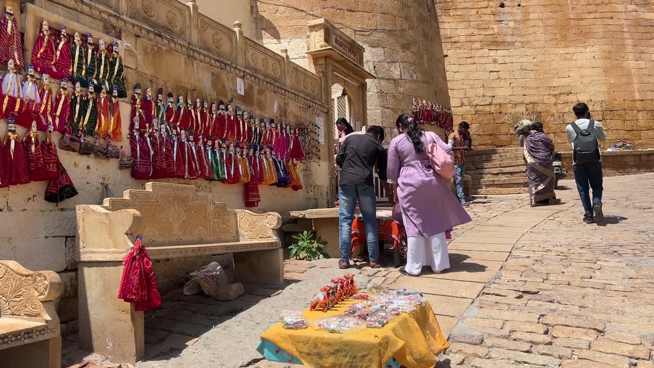 man with harmonium and harmonium in the street of Rajasthan