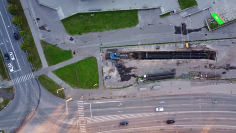 groundwork, sewage, and water plumbing systems being installed in the early phase of a new construction project in purvciems, riga, latvia.