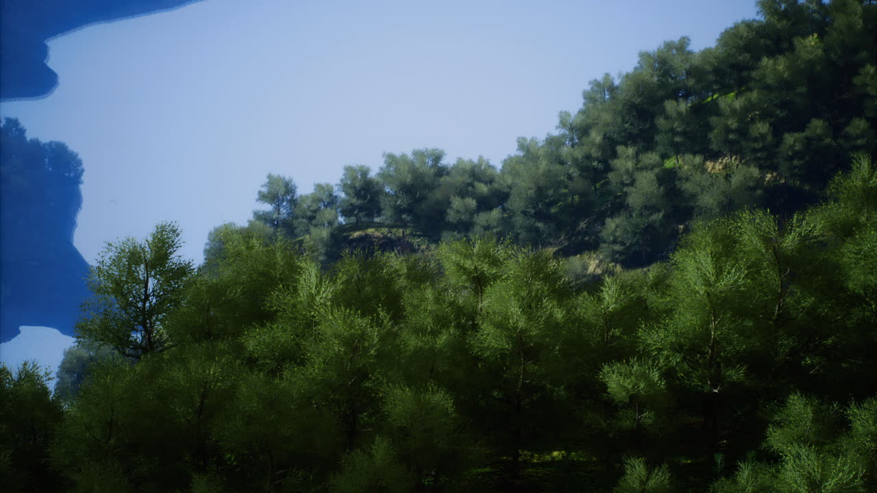 Serene landscape with mountains greenery and a clear blue sky