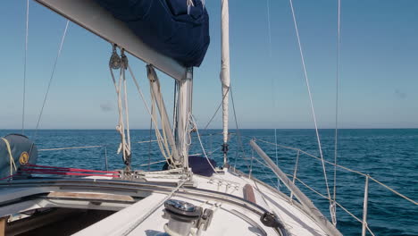 pov clip of sailboat moving through tropical waters near new caledonia