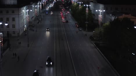 city street at night with traffic