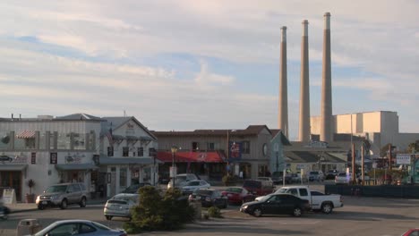 the town of morro bay in california with industrial smokestacks in background 1