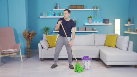 the man who started singing with a broom while he was cleaning his house by dancing.