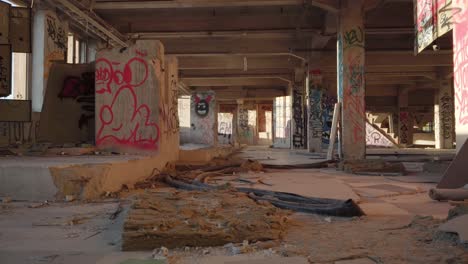 abandoned factory hall full of graffiti