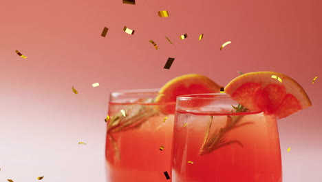 animation of confetti falling and cocktail on pink background