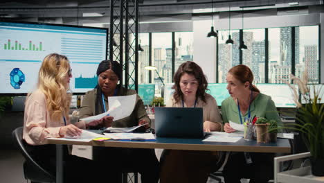 vertical video multiethnic goals oriented team of women demonstrates the power of leadership