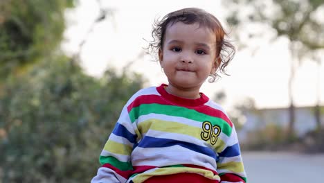 isolated-child-cute-facial-expression-at-morning-with-blurred-background