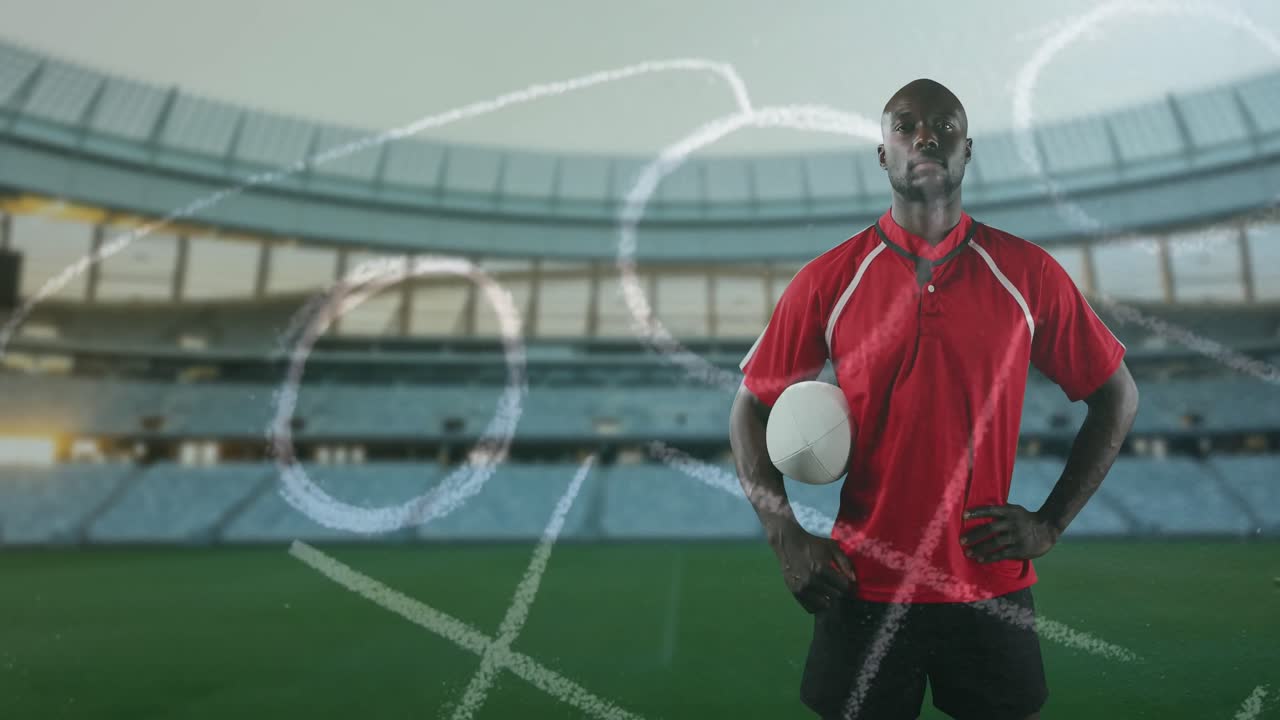 프로 럭비 선수 가 스포츠 경기장 앞 에 서 있는 4k