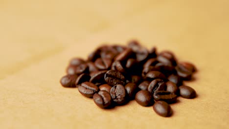 pile of coffee beans rotates in a circle slow motion vintage look