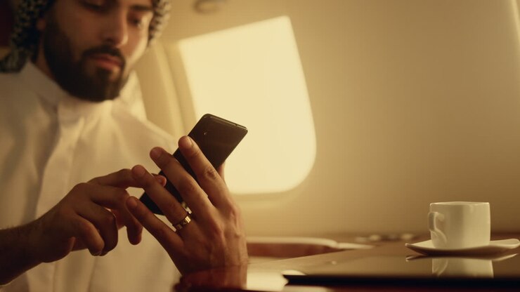 Confident businessman texting mobile phone. Closeup hands taking smartphone