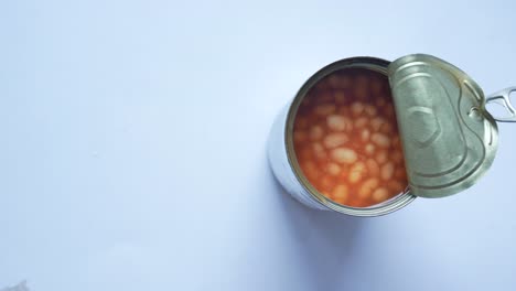 Preserved-canned-tomato-beans-on-table-,