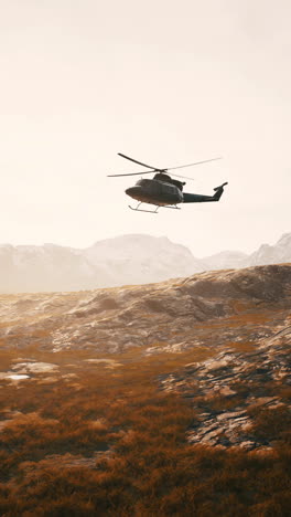 helicopter flying over mountains