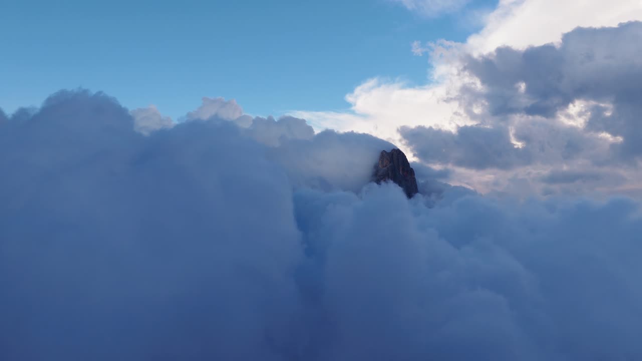 Pale di San Martino Behind The Clouds In Dolomites, Trentino, Italy. - aerial reveal shot