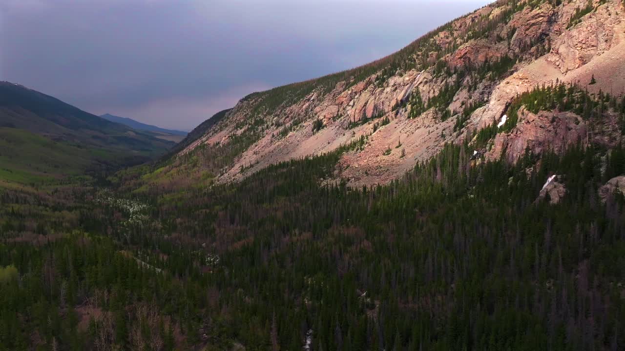 Huerfano River valley Blanca Peak Mt Mount Lindsey Lily Lake trail Sangre de Cristo Range Colorado aerial drone spring Summer San Isabel forest Rocky Mountains cloudy rain thunderstorm forward motion
