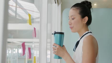 young woman working in a creative office