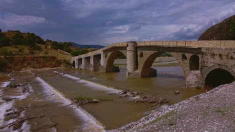 old stone bridge in greece, at the city of kalabaka, near to meteora